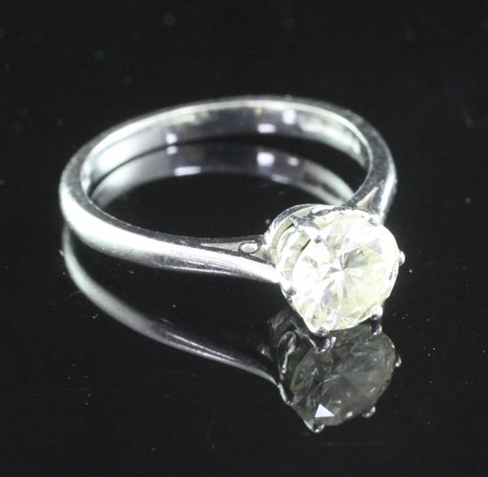 An 18ct white gold and solitaire diamond ring, size O.